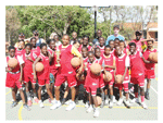 Victoria Shilongo with basketball players of the Basketball Artist School. Victoria was selected as Sportswoman of the Year by the Mandume Primary School. (Photograph by Frank Albin) 