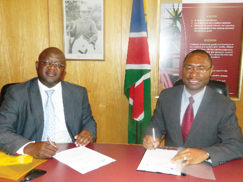 (Left to right) Lucius Murorua, chairperson of the Namibian Competition Commission and Ipumbu Shiimi, governor of the Bank of Namibia, Ipumbu Shiimi. (Photograph by Lorato Khobetsi)