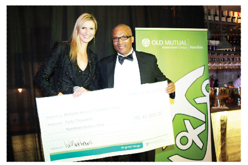 CEO of the Old Mutual Investment Group, Lionel Matthews and former beauty queen turned charity ambassador, Michelle McClean. The Old Mutual investment managers sponsored the Michelle McClean Children Trust with N$40,000.