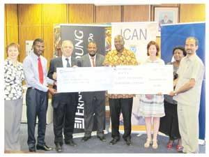 Auditing firm, Ernst & Young, and the Institute of Chartered Accountants, gave UNAM a N$240,000 sponsorship to run a competition to find the best candidates to study accounting. E&Y managing partner, Gerhard Fourie is third from the left while UNAM principal, Prof Lazarus Hangula stands in the centre.
