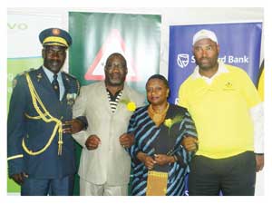 (From left to right) Joseph Shikongo. Deputy Commissioner of the Namibian Police force,  Peter Mwatile, Permanent Secretary of  the Ministry of Works and Transport, The WHO Representative to Namibia, Dr Magda Robalo with Motor Vehicle Accident Fund’s CEO, Jerry Muadinohamba at the launch of the Fund’s road safety campaign for 2012/2013. (Photograph by Lorato Khobetsi)