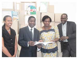 Liz Feleke, Deputy Resident Country Director of the Millennium Challenge Corporation, Hon Abraham Iyambo, Minister of Education, Penny Akwenye, CEO of MCA and Deputy Minister of Education, David Namwandi were on site to ensure the textbooks were delivered on time. (Photograph by Lorato Khobetsi)