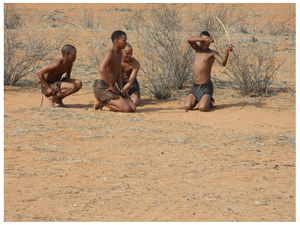 The San people showing guests how they hunt on a Bushman walk. (photograph by Melba Chipepo)