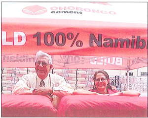 Eckhart Mueller from NIMT receiving the generous annual cement donation from Carina Sowden from Ohorongo Cement.