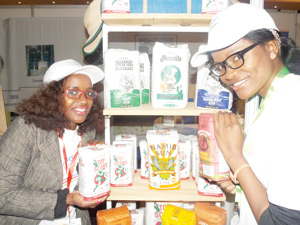Spoilt for choice. Made in Namibia Trade Expo volunteers Esther Paulus and Selma Simon showing visitors a range of locally produced staple foods known for goodness and nourishment. The three-day Made in Namibia Expo attracted 250 exhibitors, which is a substantial increase from the previous year.  President Hifikepunye Pohamba officialy opened the exhibition which serves as pointer for manufacturers to expand their operations and produce more goods for local consumption and for the export market. Participants expressed their hopes that exhibitions like this must help to create awareness and establish stronger links between producers and consumers. (Photograph by Freeman Ngulu)