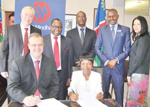 (seated f.l.t.r.), Philip Oberholzer, Chief Financial Officer at Bank Windhoek and Ericah Shafudah, Permanent Secretary of the Ministry of Finance. Standing are f.l.t.r, Johan van der Westhuizen, Executive Officer: Corporate and Executive Banking at Bank Windhoek, Lukas Nanyemba, Regional Executive: Corporate Banking at Bank Windhoek, Justus Mwafongwe, Director: Large Taxpayers and Investigations, Inland Revenue Dept, Ministry of Finance, Sam Shivute, Commissioner: Inland Revenue, Ministry of Finance and Nadine du Preez, Acting Director: Tax Administration and Support, Ministry of Finance.