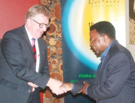 Head of division of the German Savings Banks Foundation for International Co-operation, Stefan Henkelmann, and GIPF chief executive officer, David Nuyoma, seal the Foundation’s partnership with Kongalend.