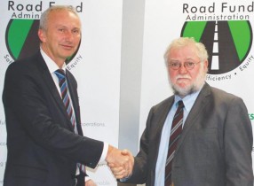 Mr Helmut Gauges (left), the Director General for Africa and the Middle East of the Kreditanstallt fuer Wiederafbau, the equivalent of a German Development Bank, with Hon. Calle Schlettwein, the Minister of Finance.