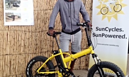 Ausiku pedals away at Tourism Expo on his own brand-new Fat-e electric bicycle