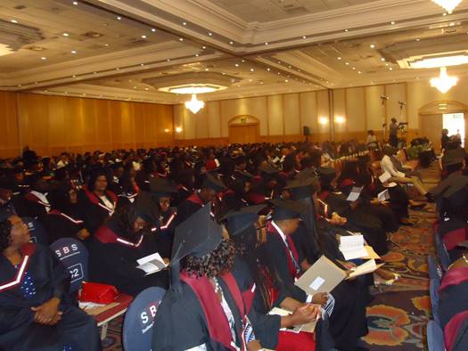 220 students capped at business school graduation