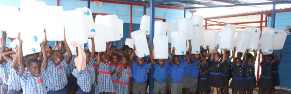 Bucket tap containers set to reduce the spread of diseases at Primary schools