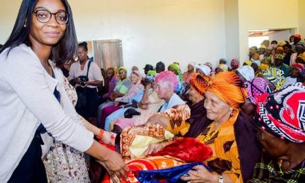 Elderly residents of five Karas homes receive winter items from multi-national brewer