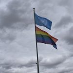 LGBTQI+ and UN flags raised in solidarity of Pride Month